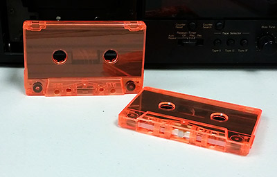 Fluorescent orange tinted cassette
