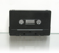 black audio cassette with magnetic leader