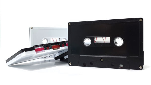 the black and white audio cassette with screws