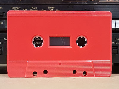 Red cassette, sonic welded, tabs out