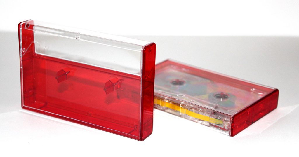 Red tinted Norelco cassette tape cases from Duplication.ca
