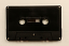 Voice-grade audio tape in a black cassette shell