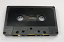 classic black audio cassette which is 32 minutes long, 16 minutes per side