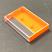 Audio cassette norelco case with opaque orange back