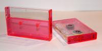 Clear/Neon Pink Tinted Norelco Case for Audio Cassettes