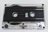 C-100 Clear Cassette with black liners (Tabs-Out) loaded with chrome tape