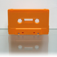 Orange audio cassette