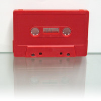 opaque red audio cassette shell